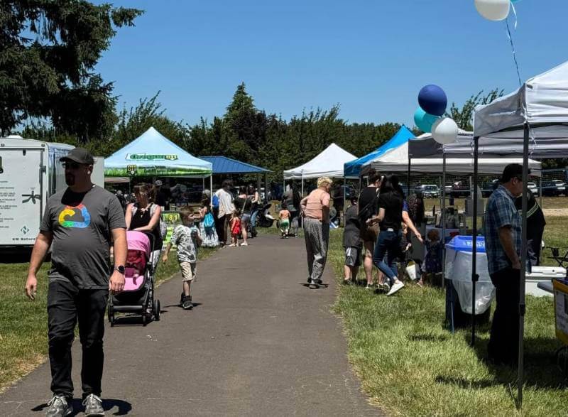 Image of an activity outside with outdoor booths in Keizer, Oregon